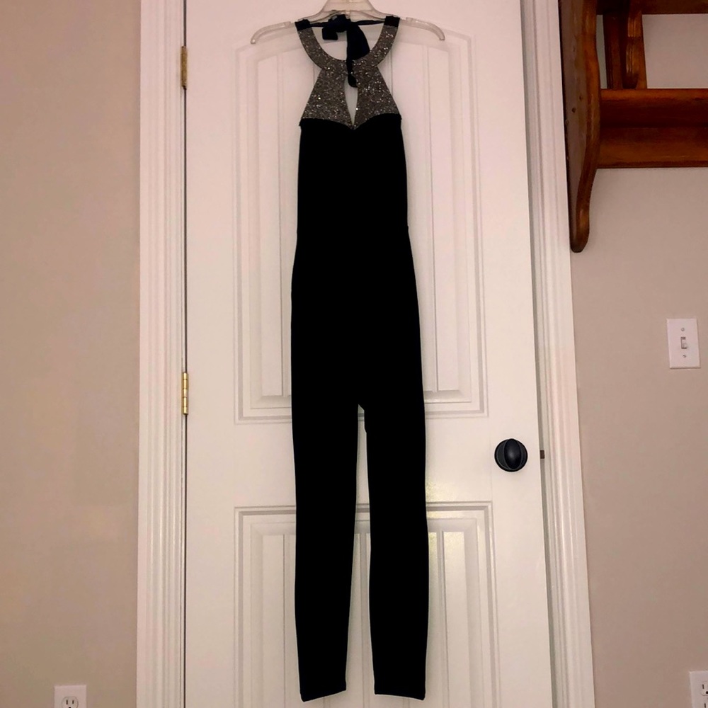 Black bodycon jumpsuit. Size XS/S